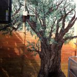 Muurschildering olijfboom in tuin Amstelveen